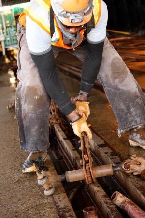 Image of steel worker wearing safety gear