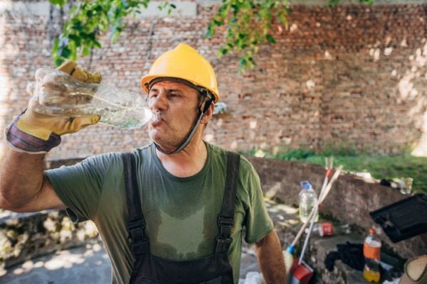Image of worker drinking water