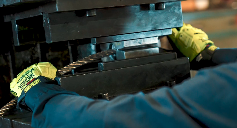 Image of steel worker using Mechanix Wear Max Cut gloves